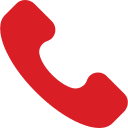 Red telephone icon depicted in a minimalist, curved shape, representing a classic handset. The icon is set against a transparent background.